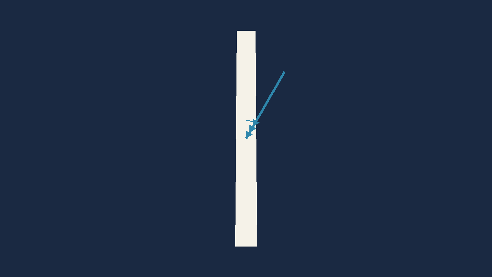 A runway seen from above with a wind arrow arriving at an angle from the right front
       quarter, the angle between the wind and the runway centreline marked.