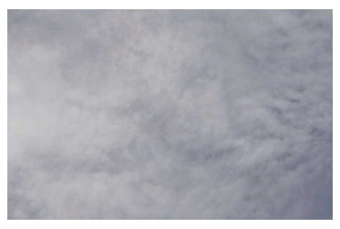 Photograph of a thin cirrostratus veil.
